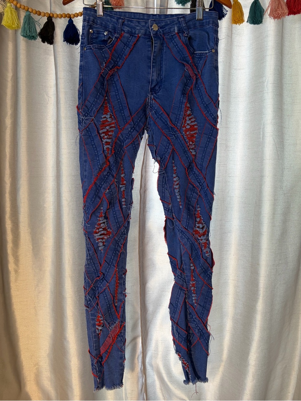 Women’s Blue Distressed Skinny Jeans with Red Accent